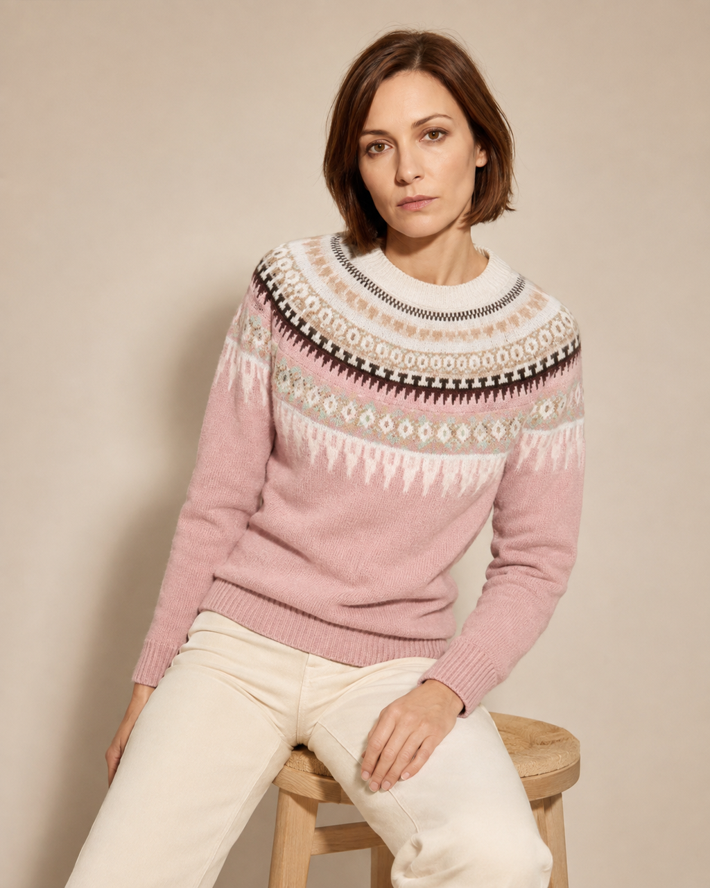 Women's Fair Isle Crewneck Knit Sweater in Pink, 03 seated or leaning, worn by model