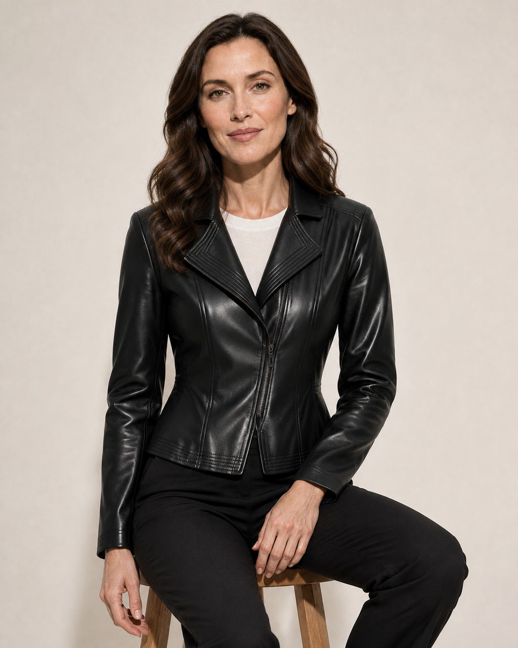 Women's Faux Leather Moto Jacket with Zip Front in Black, 03 seated or leaning, worn by model