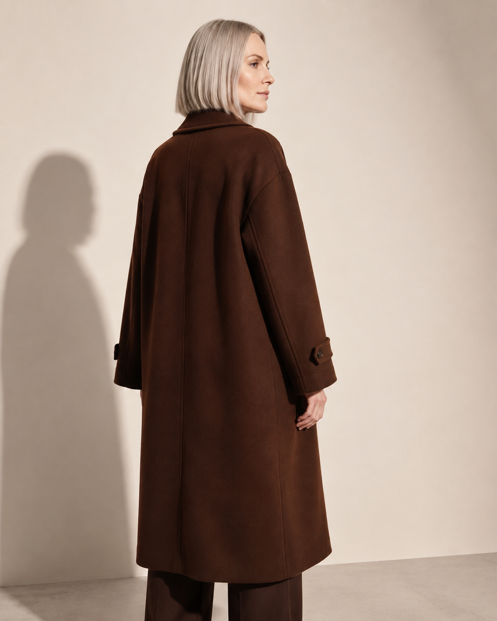 Women's Double-Breasted Long Coat with Patch Pockets in Reddish Brown, 04 back or side, worn by model