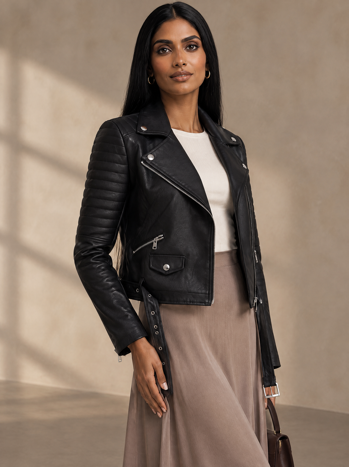 Warm editorial room · Soft sophisticated / old money Black adjusting