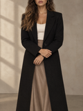 Warm editorial room · Soft sophisticated / old money Black bust to thigh